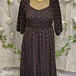BloomChic Black Dress with Red Floral Pattern